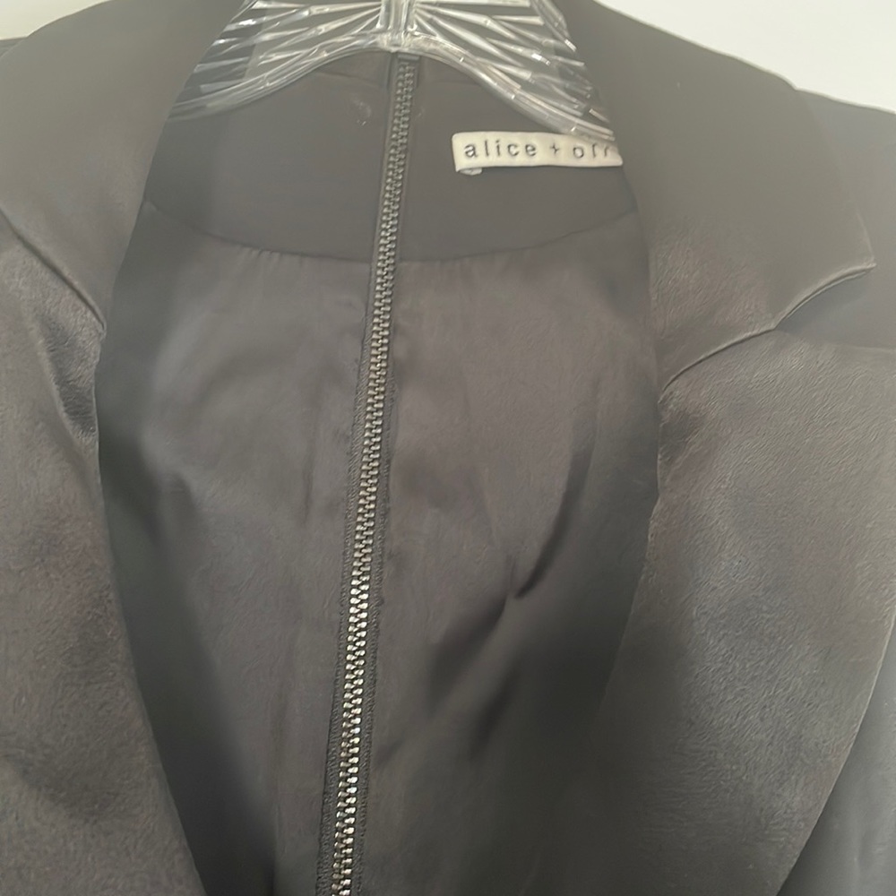 Alice and Olivia jumpsuits. Black size 4. Wore couple times. Like brand new.